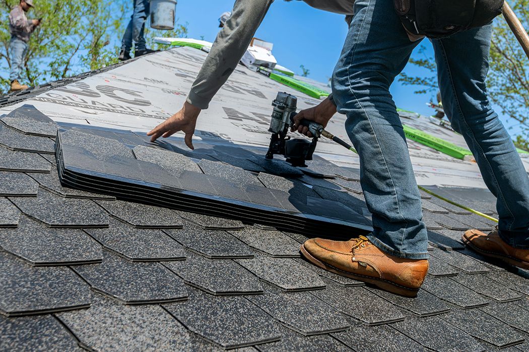 Reilly Roofing crew on a full replacement